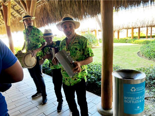 Three local musicians playing traditional music